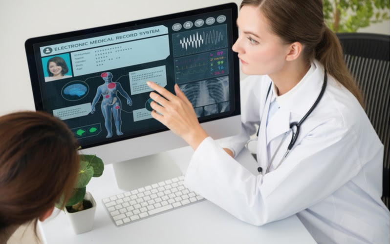 Getting-the-most-out-of-e-signatures A doctor displaying an electronic medical record system